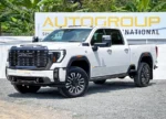 GMC white pick-up truck at Autogroup International.