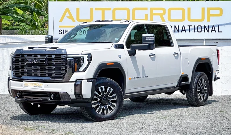 GMC white pick-up truck at Autogroup International.