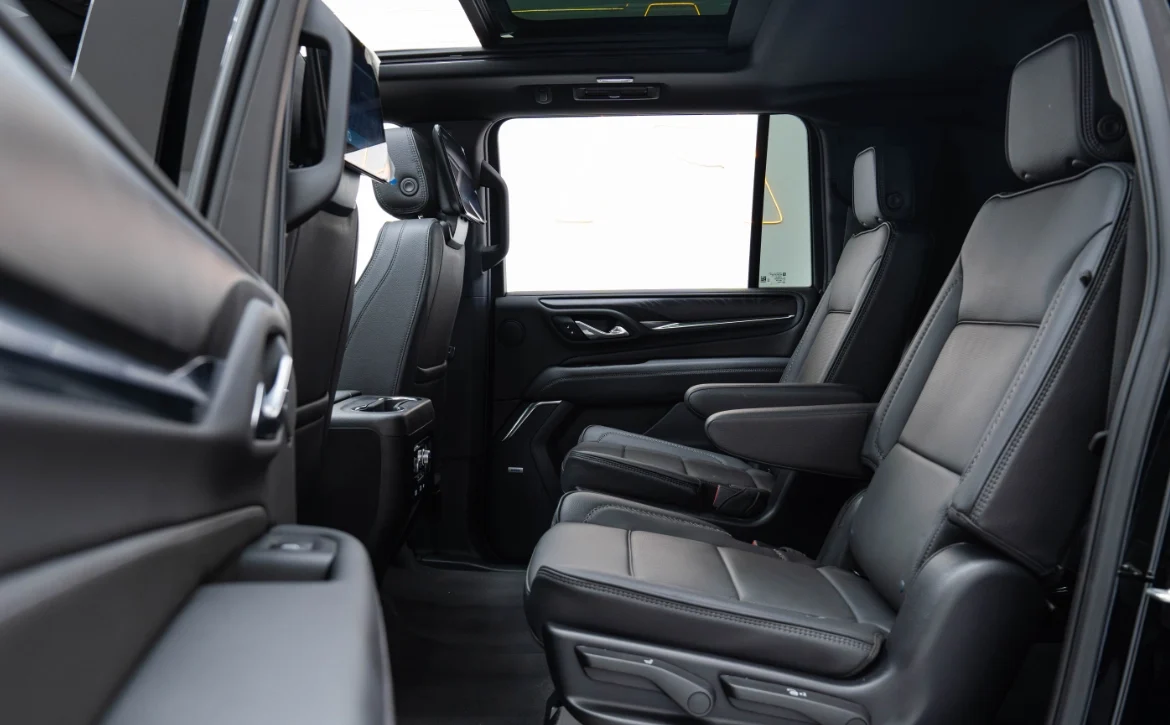 2024-gmc-yukon-denali-xl-reserve-interior-rear-side-door-seating
