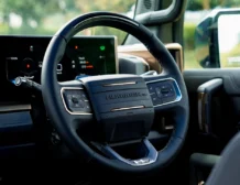 2025 GMC Hummer EV 3X Graphite Blue Metallic driving console from left