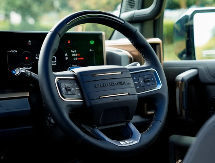 2025 GMC Hummer EV 3X Graphite Blue Metallic driving console from left