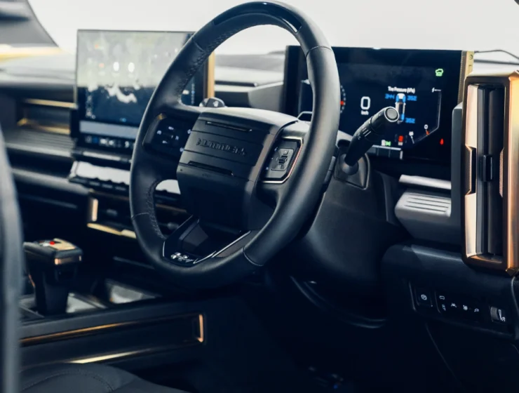 2025 GMC Hummer EV 3X Graphite Blue Metallic driving console lighter
