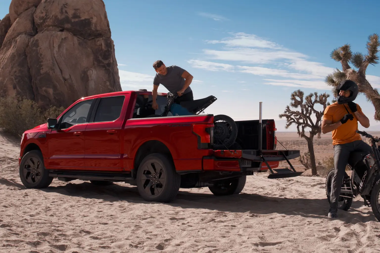 2026-Ford-F-150-Ligthing-on-a-dessert-with-sports-bikes