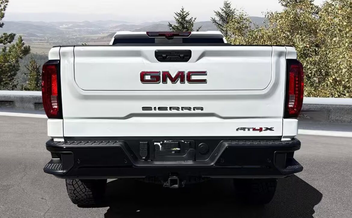 Right hand drive 2026 GMC Sierra 1500 AT4X in Summit White from Autogroup International in Australia (side)
