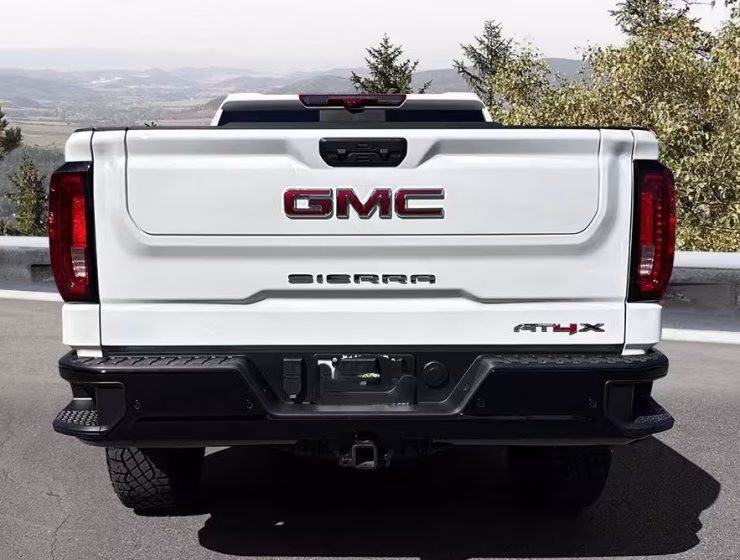 Right hand drive 2026 GMC Sierra 1500 AT4X in Summit White from Autogroup International in Australia (side)