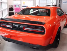 2023 Dodge Challenger SRT Hellcat Redeye Widebody in Go Mango by Autogroup International - ready for right hand drive conversion