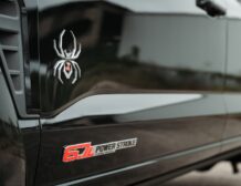 Right hand drive Black Widow F-250 Lariat Pickup truck from Autogroup International in Australia with powered side steps