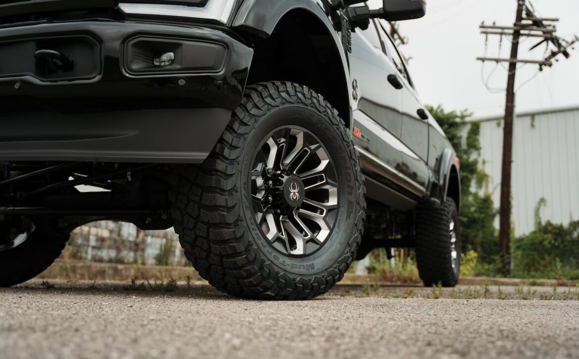 Right hand drive Black Widow F-250 Lariat Pickup truck from Autogroup International in Australia with powered side steps