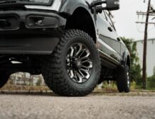 Right hand drive Black Widow F-250 Lariat Pickup truck from Autogroup International in Australia with powered side steps