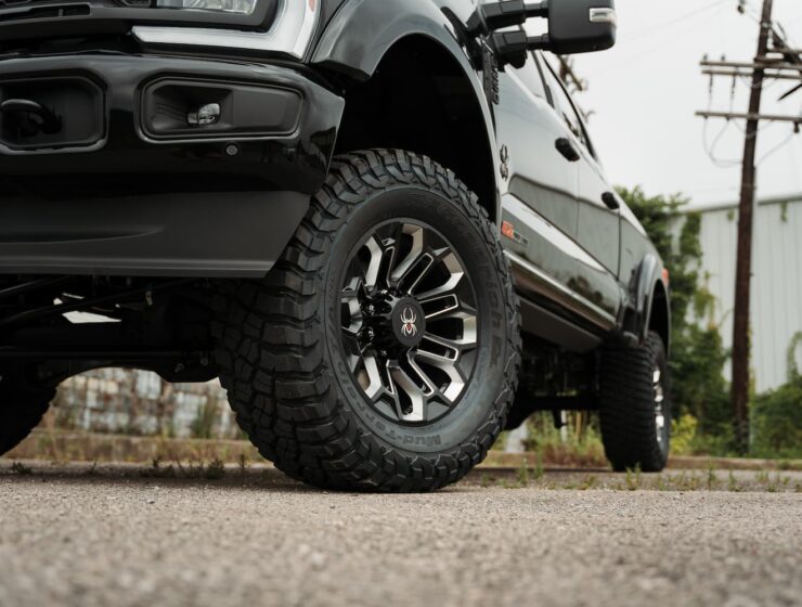 Right hand drive Black Widow F-250 Lariat Pickup truck from Autogroup International in Australia with powered side steps