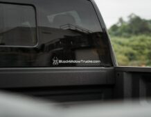 Right hand drive Black Widow F-250 Lariat Pickup truck from Autogroup International in Australia with powered side steps