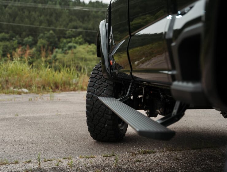Right hand drive Black Widow F-250 Lariat Pickup truck from Autogroup International in Australia with powered side steps