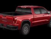 Right hand drive 2026 GMC Sierra 1500 AT4X Pickup truck from Autogroup International ready for Australia - rear qtr view