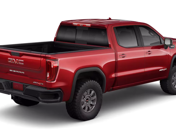 Right hand drive 2026 GMC Sierra 1500 AT4X Pickup truck from Autogroup International ready for Australia - rear qtr view