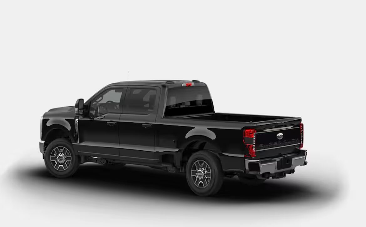 The right hand drive 2026 Ford F-350 Super Duty Lariat Crew Cab in Agate Black from Autogroup International