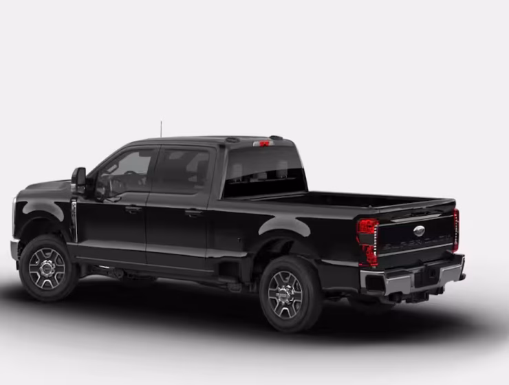 The right hand drive 2026 Ford F-350 Super Duty Lariat Crew Cab in Agate Black from Autogroup International