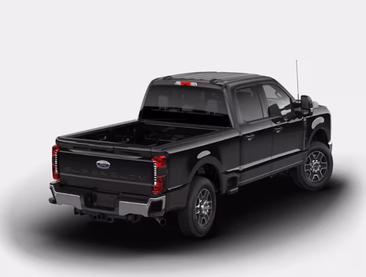 The right hand drive 2026 Ford F-350 Super Duty Lariat Crew Cab in Agate Black from Autogroup International