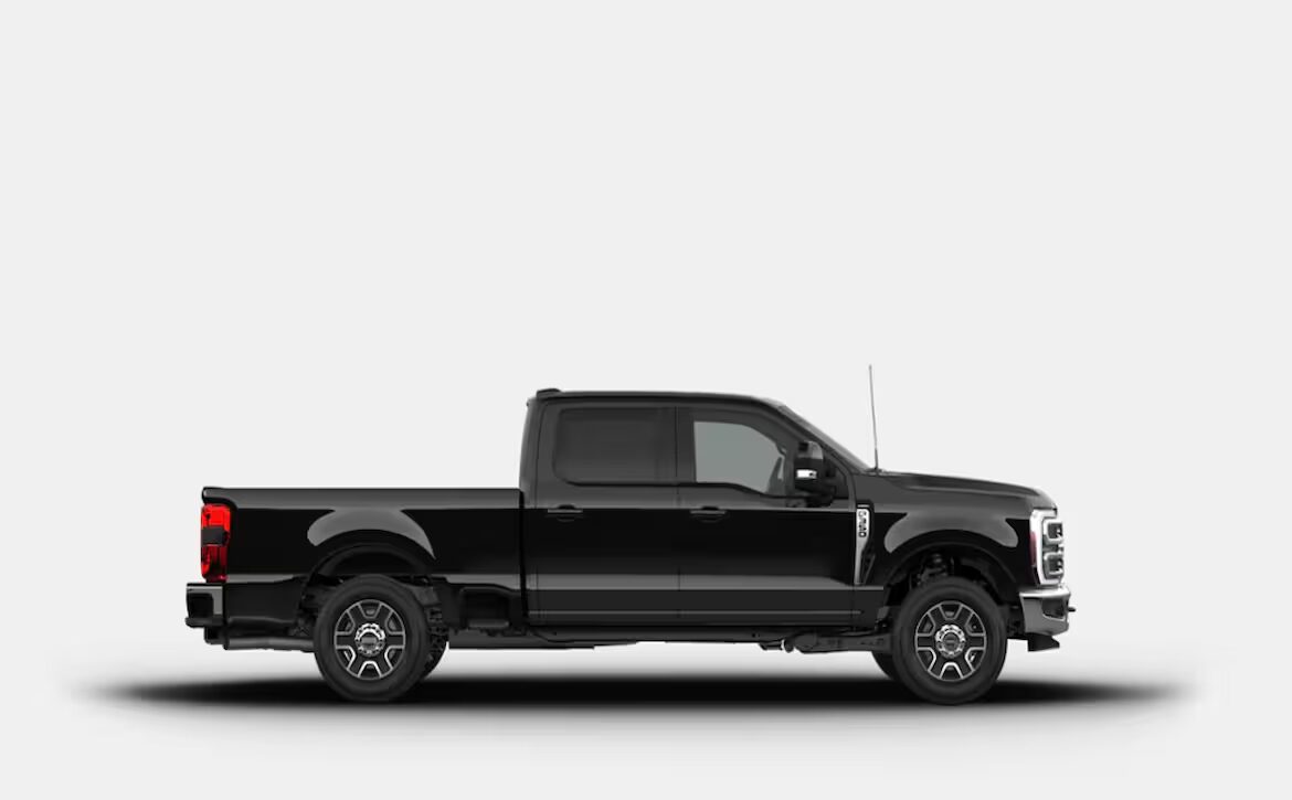 The right hand drive 2026 Ford F-350 Super Duty Lariat Crew Cab in Agate Black from Autogroup International