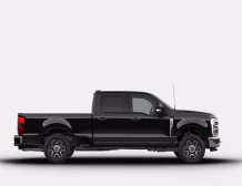 The right hand drive 2026 Ford F-350 Super Duty Lariat Crew Cab in Agate Black from Autogroup International