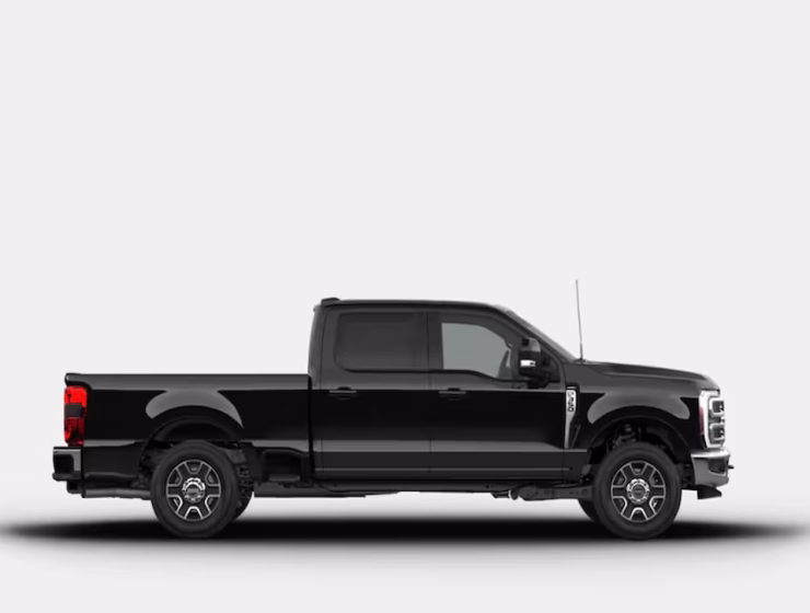 The right hand drive 2026 Ford F-350 Super Duty Lariat Crew Cab in Agate Black from Autogroup International