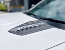 Right hand drive 2026 Chevrolet Silverado 3500 DRW High Country pickup truck from Autogroup International in Australia - Duramax logo on bonnet