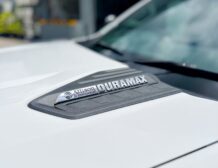 Right hand drive 2026 Chevrolet Silverado 3500 DRW High Country pickup truck from Autogroup International in Australia - Duramax logo on bonnet