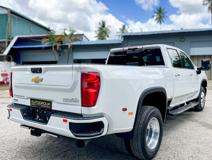 Right hand drive 2026 Chevrolet Silverado 3500 DRW High Country pickup truck from Autogroup International in Australia - rear qtr view