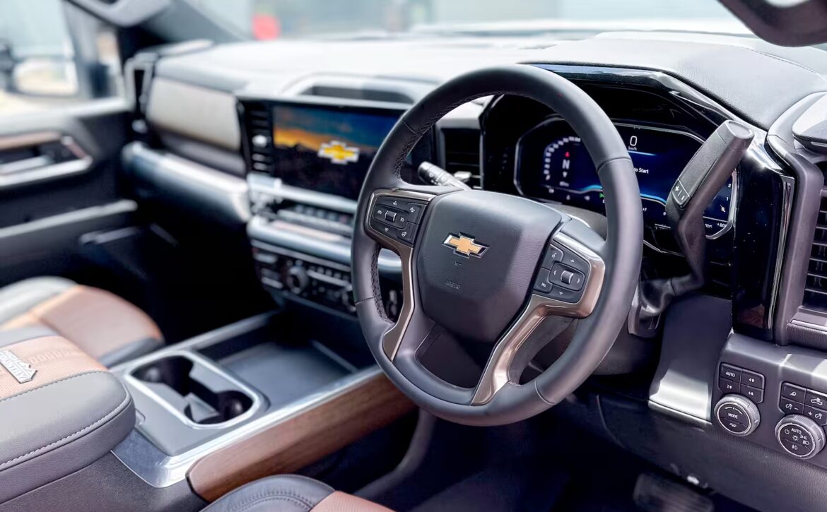 Right hand drive 2026 Chevrolet Silverado 3500 DRW High Country pickup truck from Autogroup International in Australia - right hand drive dashboard and seats