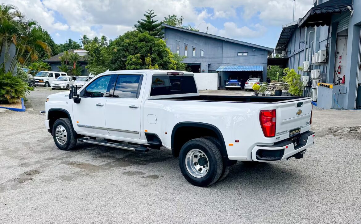 Right hand drive 2026 Chevrolet Silverado 3500 DRW High Country pickup truck from Autogroup International in Australia - side view
