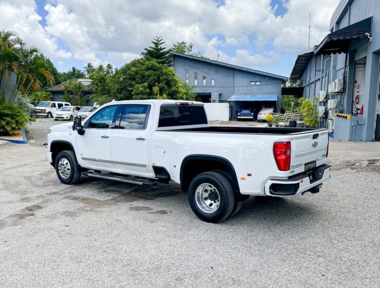 Right hand drive 2026 Chevrolet Silverado 3500 DRW High Country pickup truck from Autogroup International in Australia - side view