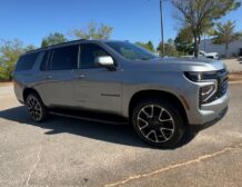 Right hand drive 2026 Chevrolet Suburban RST in Sterling Metallic from Autogroup International