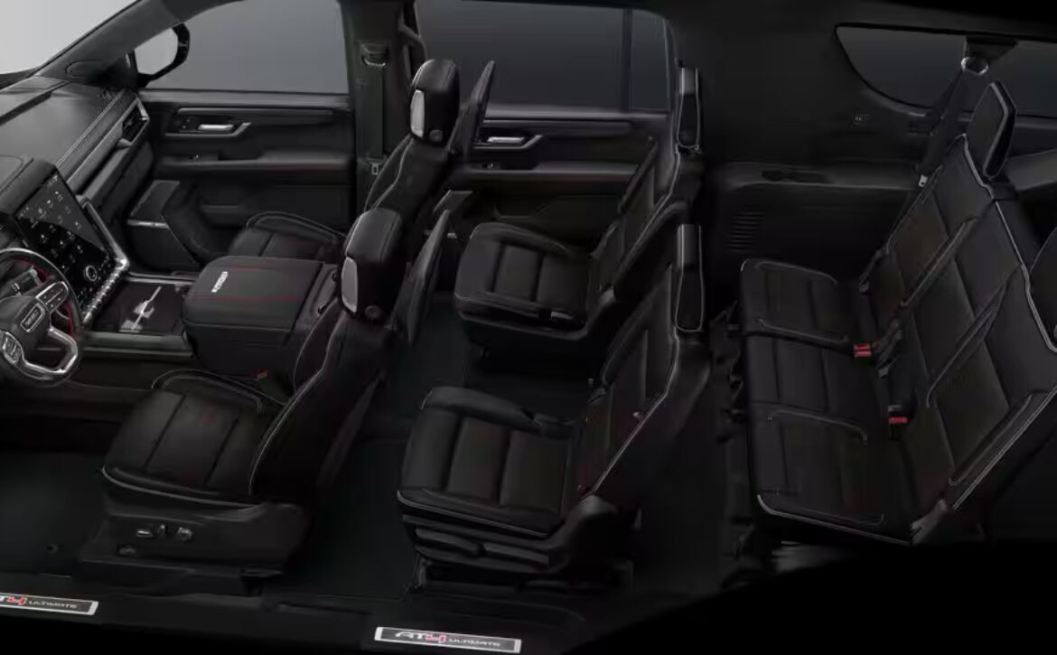 Right hand drive 2026 GMC Yukon XL AT4 Ultimate in Summit white from Autogroup International (front view)