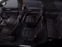 Right hand drive 2026 GMC Yukon XL AT4 Ultimate in Summit white from Autogroup International (front view)