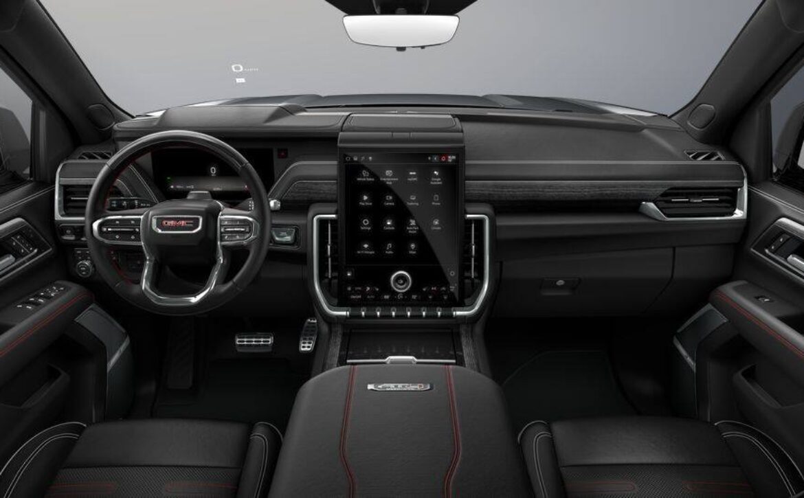 Right hand drive 2026 GMC Yukon XL AT4 Ultimate in Summit white from Autogroup International (front view)