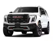 Right hand drive 2026 GMC Yukon XL AT4 Ultimate in Summit white from Autogroup International (front view)