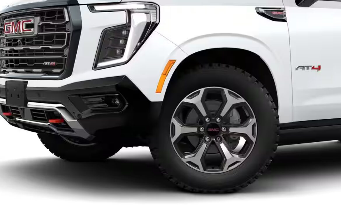 Right hand drive 2026 GMC Yukon XL AT4 Ultimate in Summit white from Autogroup International (front view)