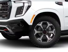 Right hand drive 2026 GMC Yukon XL AT4 Ultimate in Summit white from Autogroup International (front view)