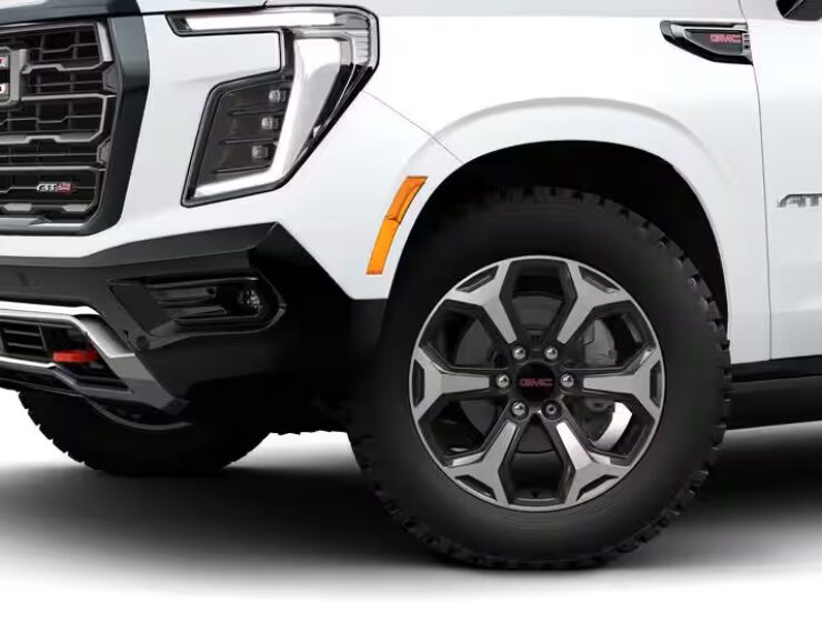 Right hand drive 2026 GMC Yukon XL AT4 Ultimate in Summit white from Autogroup International (front view)