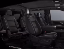 Right hand drive 2026 GMC Yukon XL AT4 Ultimate in Summit white from Autogroup International (front view)