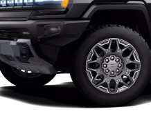 Right hand drive 2026 Hummer EV 3X SUT (Pickup truck) from Autogroup International in Australia inside cabin view with offroad tyres and 6-inch lift