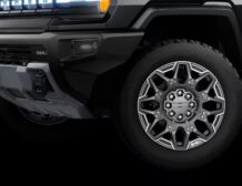 Right hand drive 2026 Hummer EV 3X SUT (Pickup truck) from Autogroup International in Australia inside cabin view with offroad tyres and 6-inch lift
