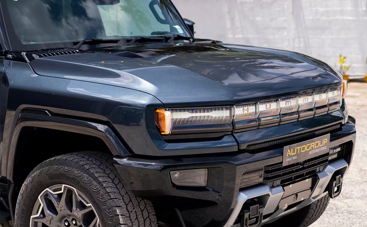 Right hand drive 2026 Hummer EV SUV 3X in Graphite Blue Metallic from Autogroup International - front quarter view