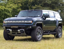 Right hand drive 2026 Hummer EV SUV 3X in Graphite Blue Metallic from Autogroup International