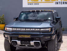 Right hand drive 2026 Hummer EV SUV 3X in Graphite Blue Metallic from Autogroup International - front view