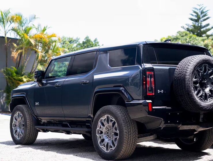 Right hand drive 2026 Hummer EV SUV 3X in Graphite Blue Metallic from Autogroup International - rear end view