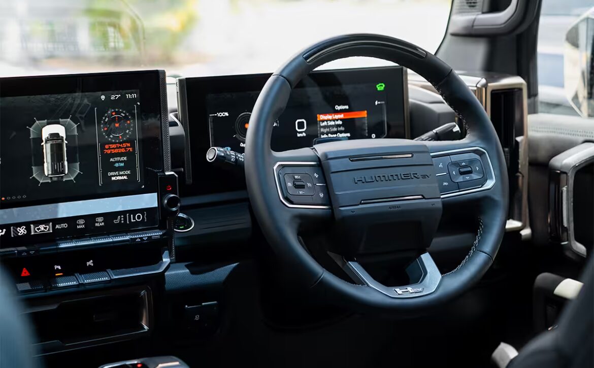 Right hand drive 2026 Hummer EV SUV 3X in Graphite Blue Metallic from Autogroup International - RHD steering wheel