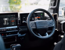 Right hand drive 2026 Hummer EV SUV 3X in Graphite Blue Metallic from Autogroup International - RHD steering wheel