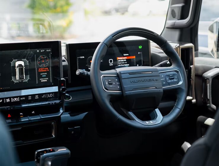 Right hand drive 2026 Hummer EV SUV 3X in Graphite Blue Metallic from Autogroup International - RHD steering wheel