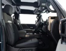 Right hand drive 2026 Hummer EV SUV 3X in Graphite Blue Metallic from Autogroup International - inside the front cabin