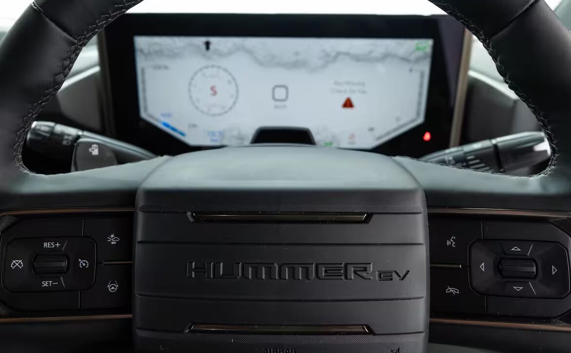 Right hand drive 2026 Hummer EV SUV 3X in Graphite Blue Metallic from Autogroup International - right hand side steering wheel